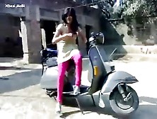 Young Indian Teen On Scooter