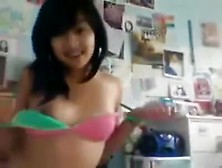 Hot Asian Teen Strips And Fingers Her Pussy