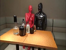 Latex Couple Has Sex In A Bar