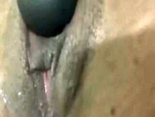 African Teases Her Gigantic Clitoris With A Sex Toy