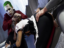 Superhero Kleio Valentien Sandwiched Between Joker And Batman
