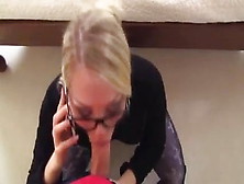 While The Guy Fucks A Young Blonde,  She Pusses On The Phone