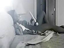 Dark-Haired Woman Masturbating Indoors Caught On A Hidden Cam