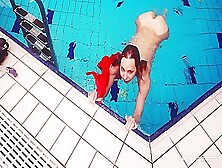 Adorable Brunette Teen Swimming