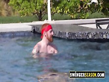 Ginger Swinger Couple Has Such Fun In The Pool Teasing Each Other And Playing The Horny Game.
