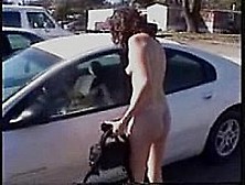 Nude Woman Driving A Car