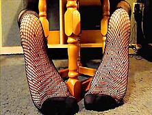 Slut Bends Over The Chair And Exposes Her Attractive Feet In Black Stockings
