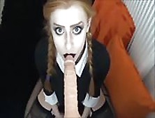 Dressed Like Wednesday Addams On Her Knees Sucking Your Cock