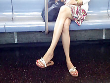 Candid Miniskirt Crossed Legs And Sandal Suspending