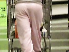 Youngster With A Nice Ass Wears A Cute Pink Sweatsuit While She Shops At The Market.