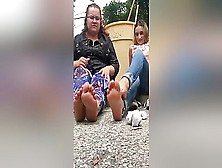 Amateur Girlfriends Sitting On The Ground In Public Showing Off Their Hot Feet