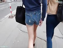 Girl In Blue Shorts
