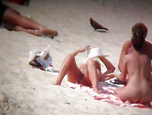 Stunning Women Relaxing Naked On A Sunny Beach