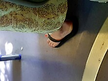 Very Sexy Feet With Red Painted Nails Of A Beautiful Young Woman In The Tram