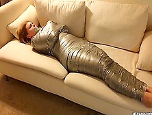 Duct Tape Wrapped Girl Gagged In Mummification Bondage