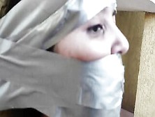Christian Sluts Duct Taped To Pillar And Gagged Tight