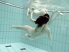 Girls Swimming Underwater And Enjoying Eachother