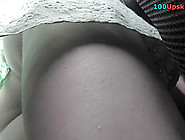 G-String And Skinny Ass Of A Redhead In Upskirt Mov
