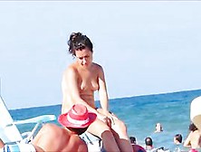 Topless Beach Beauty In Spain