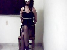 Amateur Woman In Black Tied To Chair
