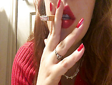 Sexy Crimsonhead Teen Smoking In Red Sweater Red Lip Liner And Red Drill Polish