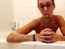 Plowing Herself In Bath With Fat Black Dildo