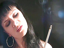 Hot Woman Has Her Hot Style Of Smoking