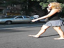 Girl With A Short Skirt Crossing The Road On Cam