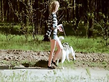 Beautiful College Girl Takes A Walk With The Dog