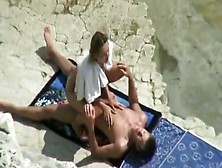 Voyeur Tapes A Couple Having Missionary And Cowgirl Sex On A Nude Beach