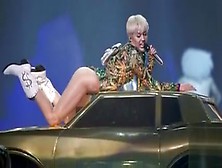 Miley Cyrus Slideshow With Erotic Scenes In Revealing Outfits