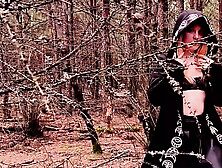Naughty Witch Is Playing With A Vibrator In The Forest