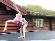 Cute Young Girls On A Trampoline