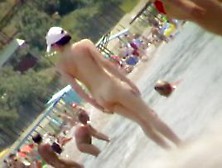 Mature Woman Showing Her Ass And Boobs On Nudist Beach