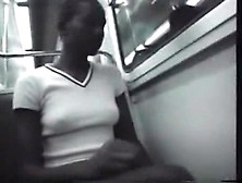 African Girl Plays On The Train