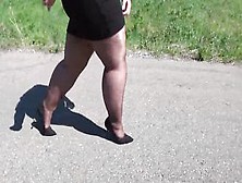 Old Bbw Inside Nylon Stockings And High Heels Walks Down The Outdoor