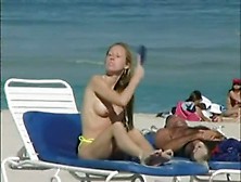 Topless Beach Voyeur Shots Of Cute Girls Relaxing Themselves