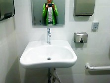 Travelling Naughty Lady Pissing In The Toilet For A Disabled At The Airport