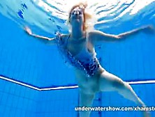 Cute Lucie Is Stripping Underwater