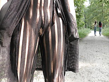 Hairy Cougar In Transparent Dress In Public Park