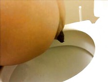 Sweet Brunette Girl Pooping In Toilet