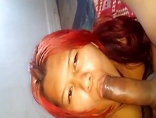 Redhead Ebony Lady With Huge Juggs Playing With A Penis