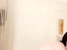Redheaded Milf Gets Naked And Takes A Shower