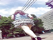 Girl With Plump Ass Walking In The Street In Short Skirt