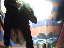 Dressed In Black Babe Is Peeing On The Spy Cam
