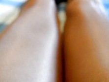 Rubbing Legs And Feet In Glossy Tan Pantyhose