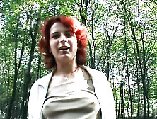 A Redhead German Woman Loves Masturbating In The Forest