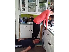Amateur Housewife Slapping Her Man's Face With Her Feet In The Kitchen