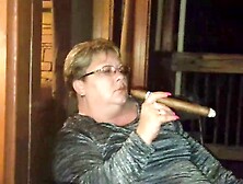 Smokin' Hot Tennessee Milf Enjoys An Enormous Cigar Outdoors