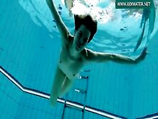 Podvodkova Swimming In Blue Bikini In The Pool